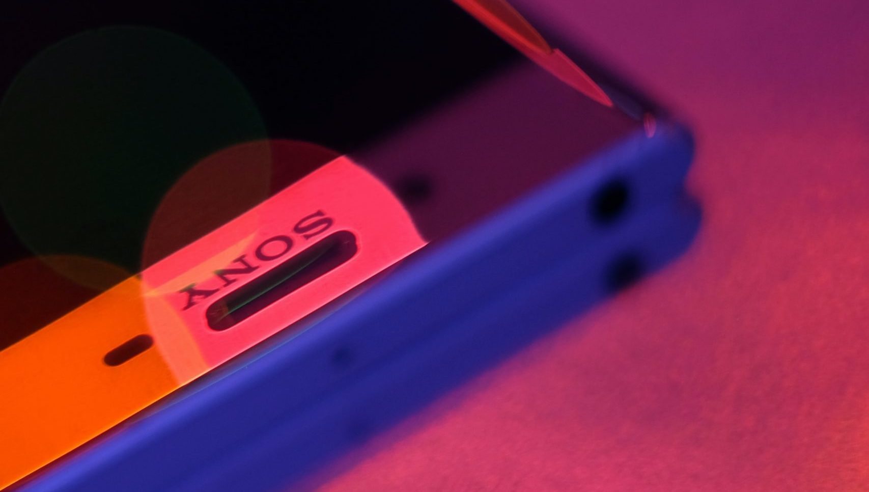 Sony Xperia Smartphone Red Blue Light Unsplash Header